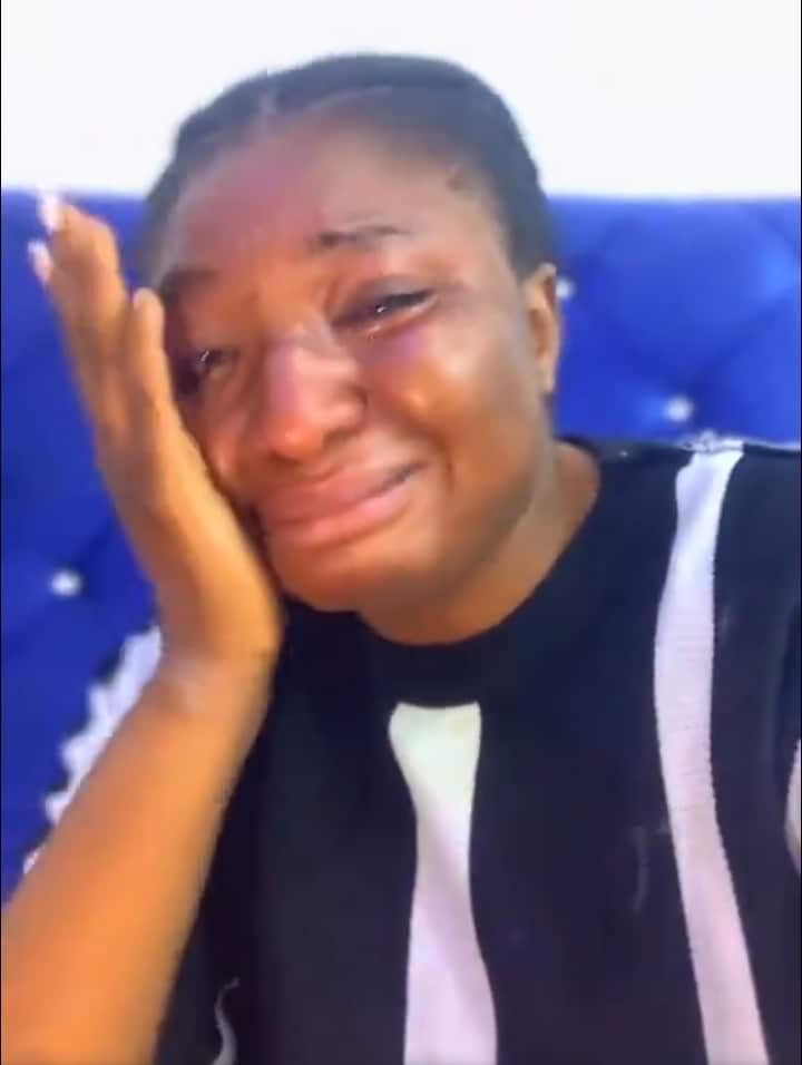 Distraught woman crying after her phone was stolen from her new apartment window.