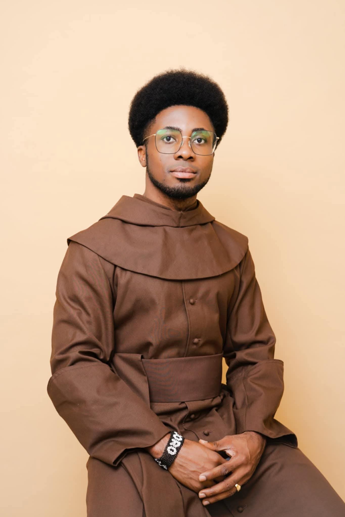 Reverend Father Prince Chidi Philip stands in contemplation.