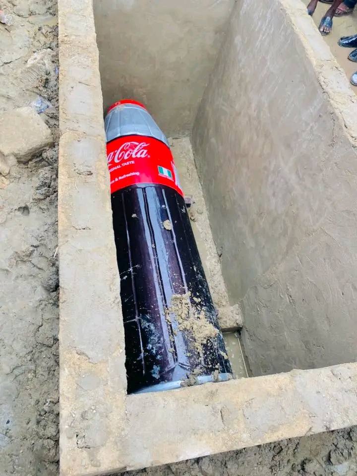 A unique Coca-Cola themed casket at a funeral