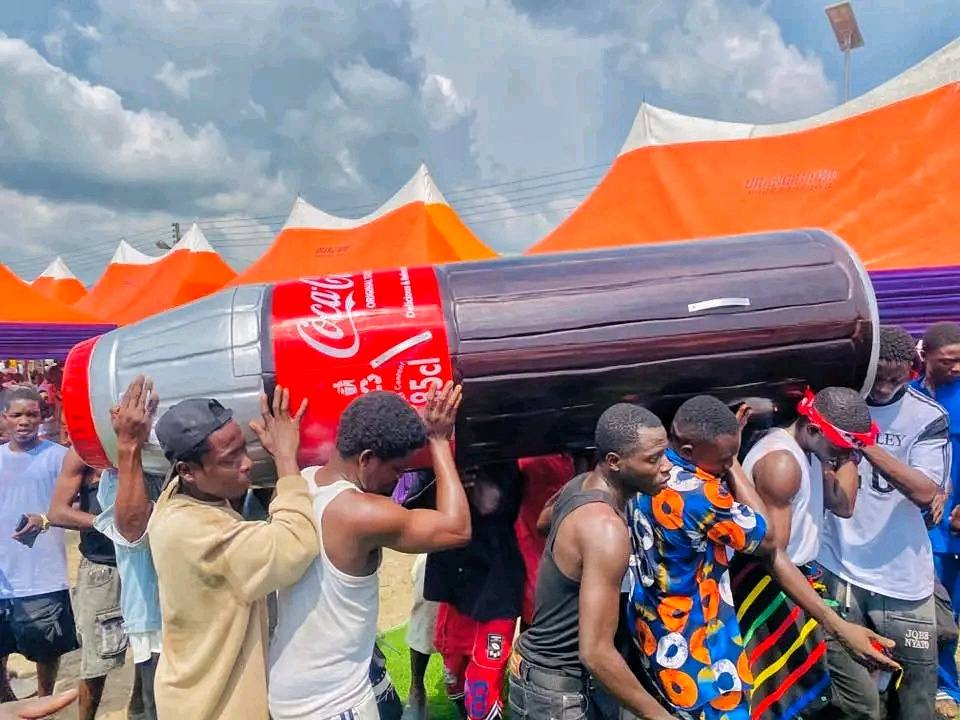 Mourners at the funeral with the custom casket