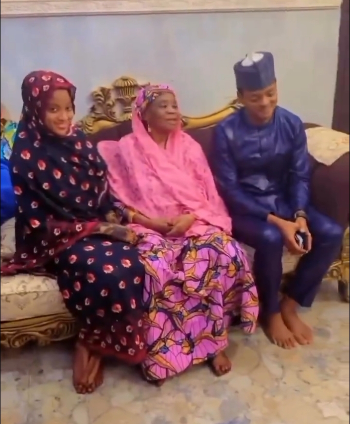 Lieutenant Yerima and wife with an elderly woman
