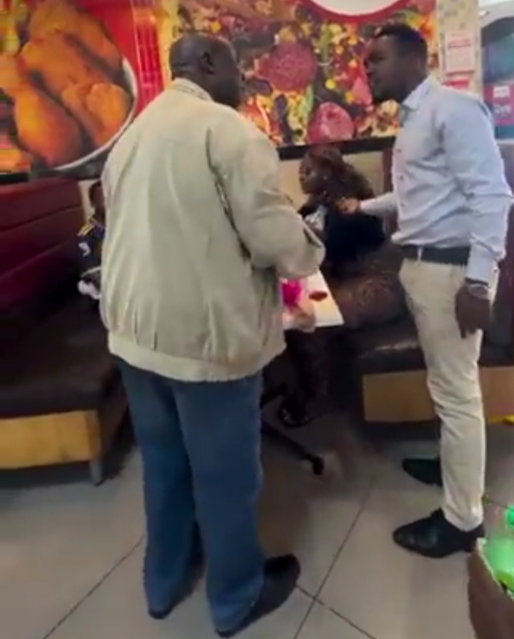 Intense confrontation unfolds during a marriage proposal at a restaurant.