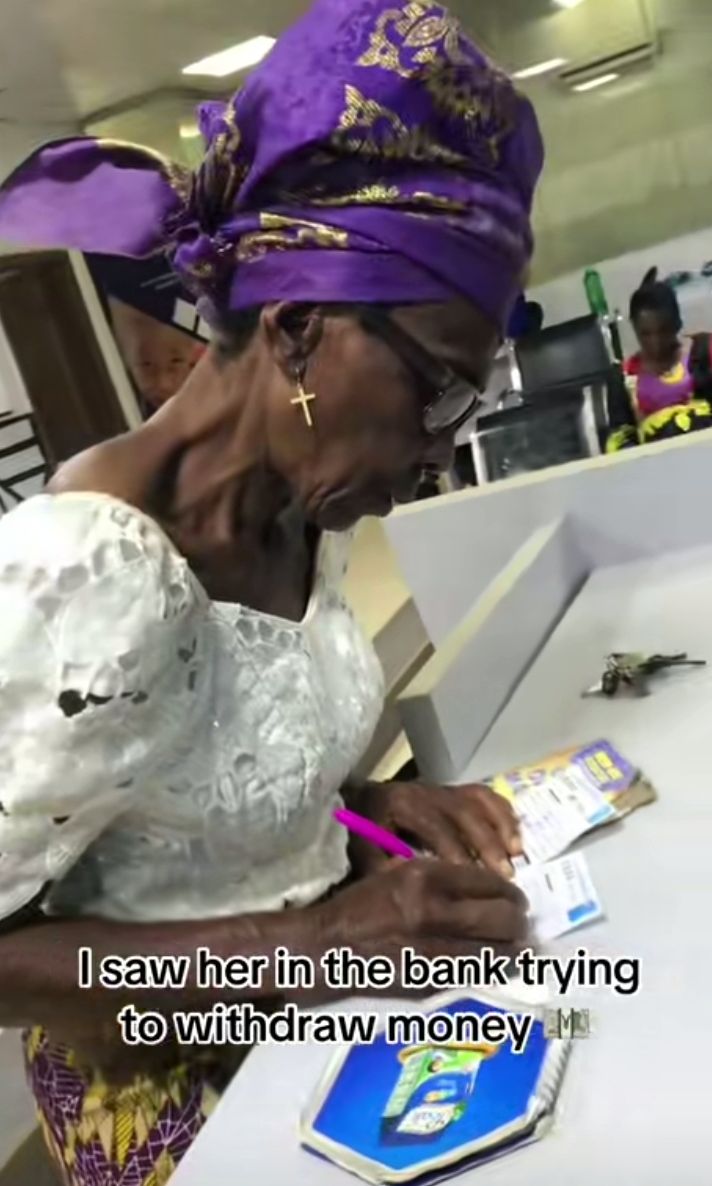 Screenshot from the viral TikTok video showing the elderly woman at the bank
