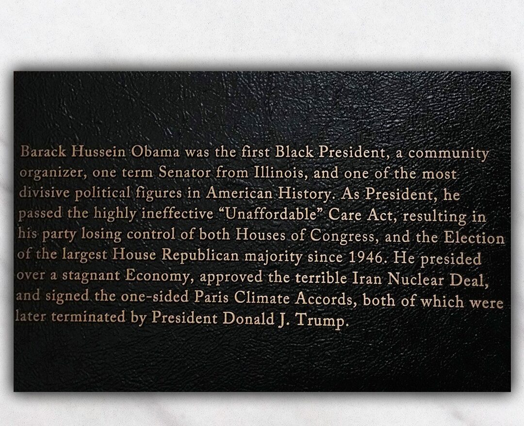 White House interior with presidential portraits and controversial plaques
