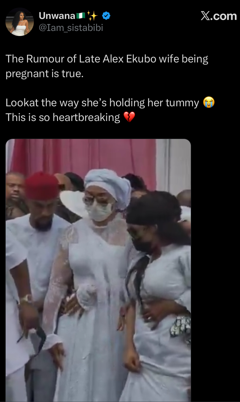 Screenshot showing Alex Ekubo’s wife holding her abdomen at the burial